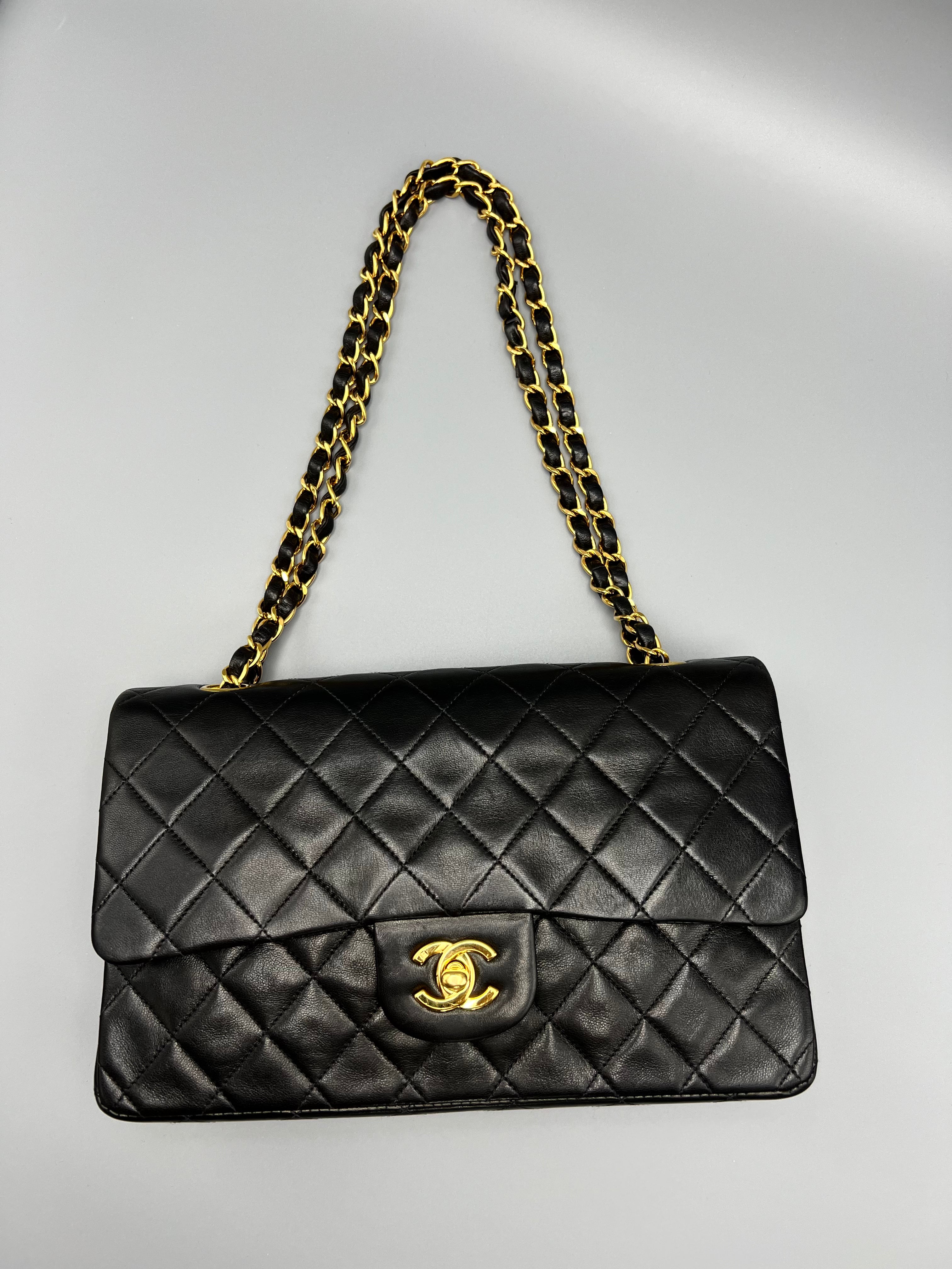 Pre-loved Chanel Black Medium Classic Flap Bag