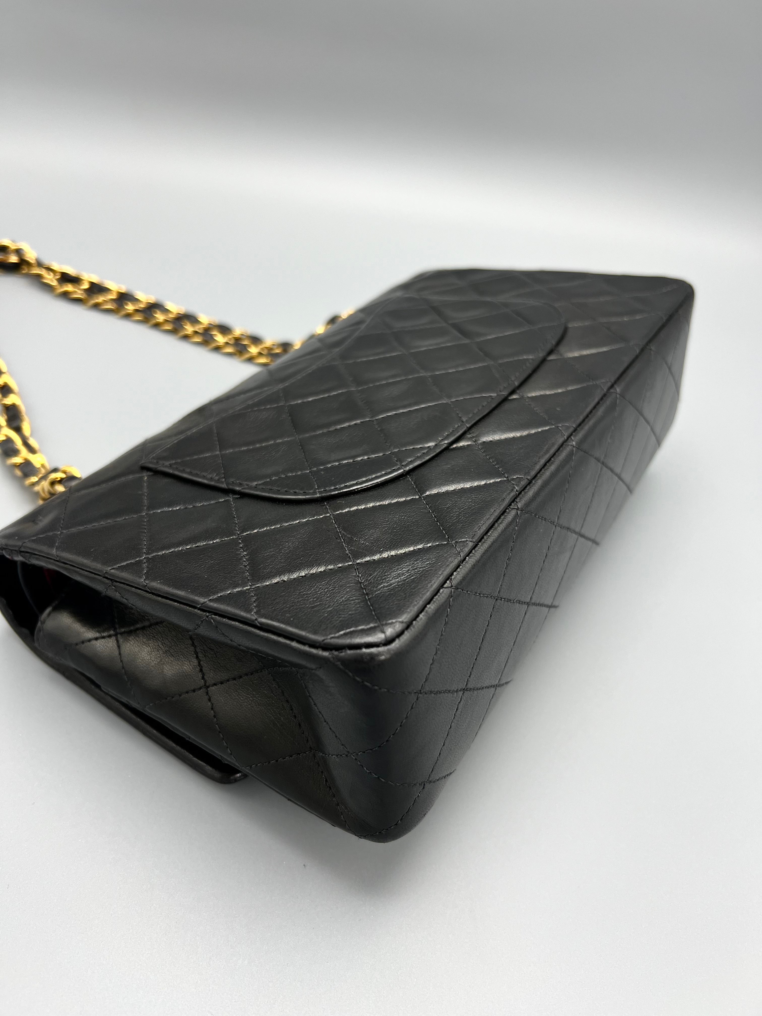 Pre-loved Chanel Black Medium Classic Flap Bag